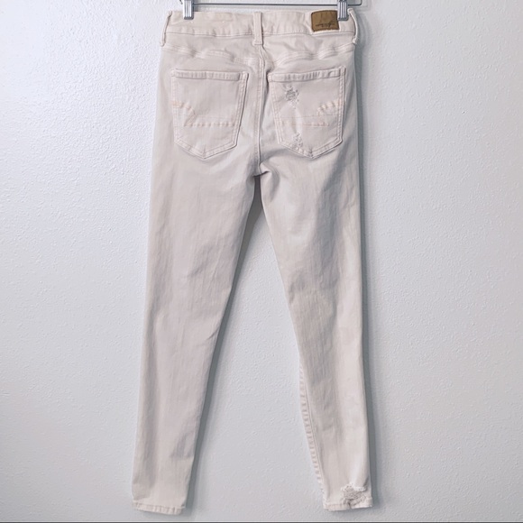 AE 🦅 Light Peach Next Level Stretch High Rise Distressed Jegging Jeans - Picture 7 of 9